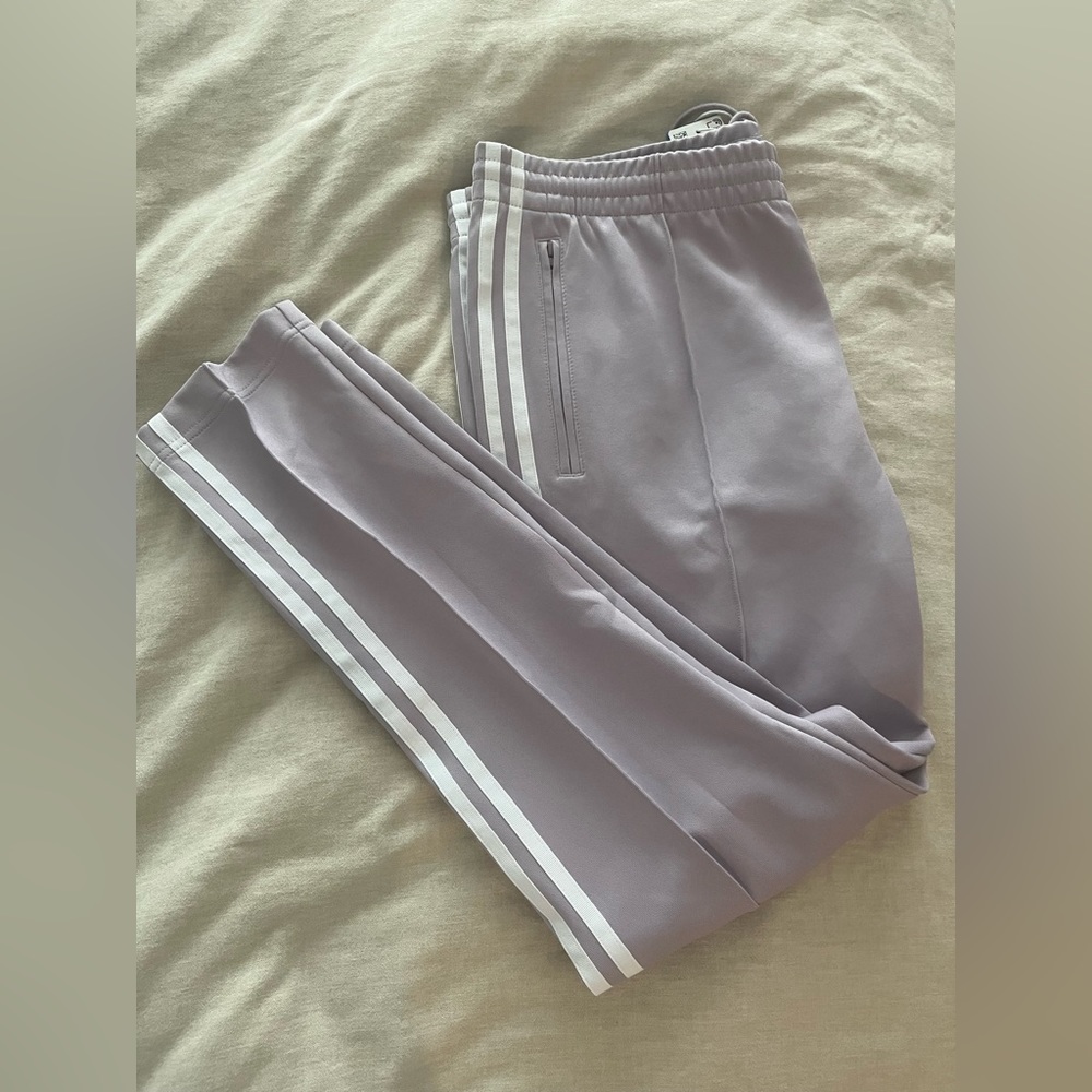 Lilac Addidas track pants, size large